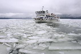 Excursion ship Mashu Maru breaks ice on Lake Akan