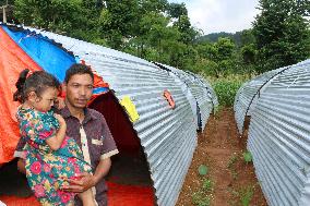 Nepal quake survivor gets tin-roofed shelter