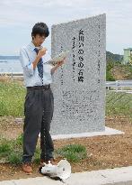 High schooler explains tsunami monument in northern Japan town