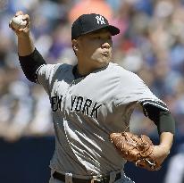 Tanaka goes distance as Yanks increase lead over Jays