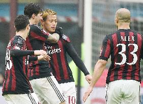 AC Milan's Honda scores in Seria A match against Genoa