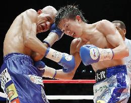 Taguchi defends WBA light fly title