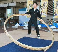 Soy sauce maker invents hula hoop-like activity to promote tradition