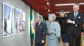 Emperor attends photo exhibition
