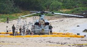U.S. military helicopter lands on Okinawa beach