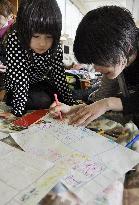 Children at evacuation shelter