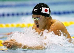 Olympic champ Kitajima powers to breaststroke double