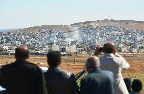 Smoke grows in Kurdish town after airstrikes