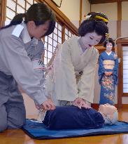 Tokyo geishas receive cardiac massage training