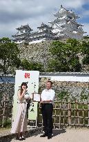 Woman gets gifts as millionth visitor to renovated Himeji Castle