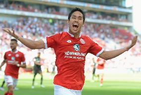 Japanese footballer Muto jubilant after scoring 1st goal in Europe