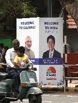 Abe in India for talks with Modi, new high-speed train ceremony