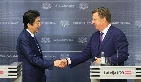 Japan's PM Abe visits Latvia