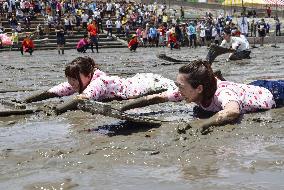 Muddy sports event in Japan