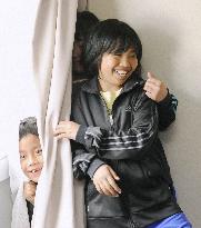 Tsunami survivors begin moving into temporary housing