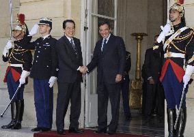 Kan greeted by French PM Fillon