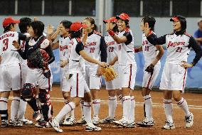 Japan rolls over Canada in final softball preliminary in Beijing