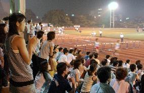 Beer mixes well with track and field competition