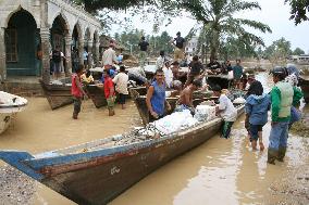 52 killed, over 400 missing in floods in Indonesia's Aceh