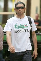 Japanese MLB player Ichiro with 'OCOSITE' T-shirt