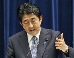 Abe cites deep remorse, apology in WWII statement