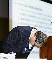 Toshiba logs FY 2014 net loss as probe finds 155 bil. yen padding