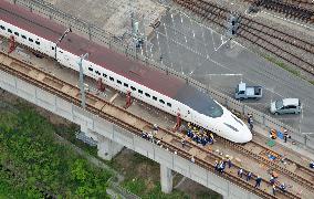 Recovery work on derailed bullet train starts