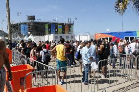 FEATURE: Olympic torchbearer king of hill at Copacabana Beach