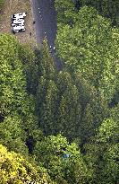 Minibus slides down mountain slope in Japan