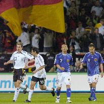 Japan hold World Cup hosts Germany to 2-2 draw