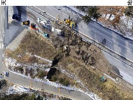 Shin-Etsu Expressway blocked by soil from collapsed roadside wal