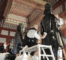 Buddhist statues at Nara temple get New Year's dust-off