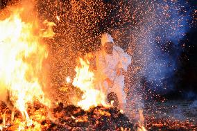 Man braves fire sparks at festival in southwestern Japan