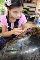 Traditional lacquerware workshops flourish in Myanmar tourist spot