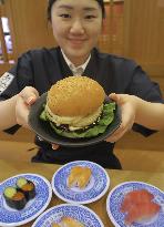 Hamburger on menu at sushi chain
