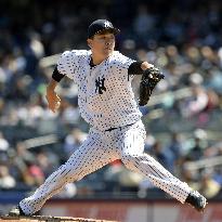 Tanaka gets no-decision in Yankees' victory