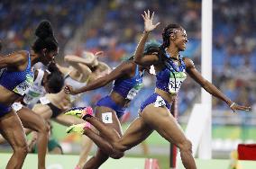 Olympics: Rollins leaps to gold in women's 100m hurdles