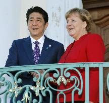 Abe, Merkel differ over fiscal stimulus ahead of G-7 summit