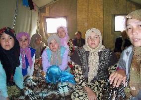 (2)Uzbek refugees say they will never reutrn