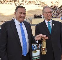 Olympic torch handed to Rio 2016 organizing committee