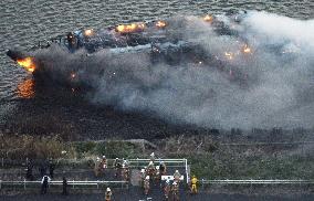 Houseboat in flames in Tokyo