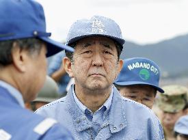 Japan PM Abe visits typhoon-affected area