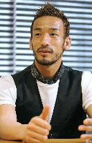 Japan play soccer like a computer, says former star Nakata