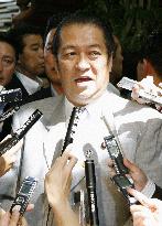 Hatoyama leaves Cabinet over Japan Post row