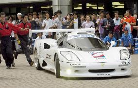 Tokai Univ. students devise racing car, conduct demonstration ru