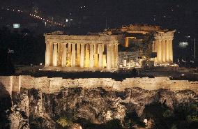 (1)Torch in Athens, Lewis carries flame toward Acropolis