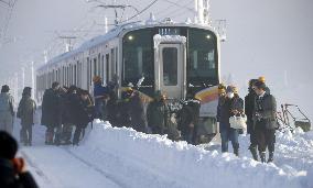 Train stranded by heavy snowfall in Japan