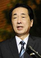 Kan speaks to reporters