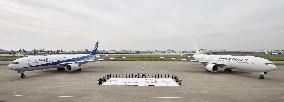 ANA, JAL unveil planes with Tokyo Olympics logo