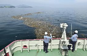 Marine debris widespread after flooding in western Japan
